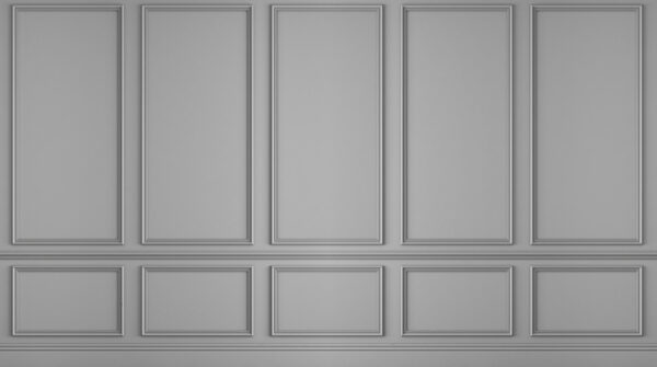 Eine Wand mit weißen Paneelen Eine Wand mit weißen Paneelen