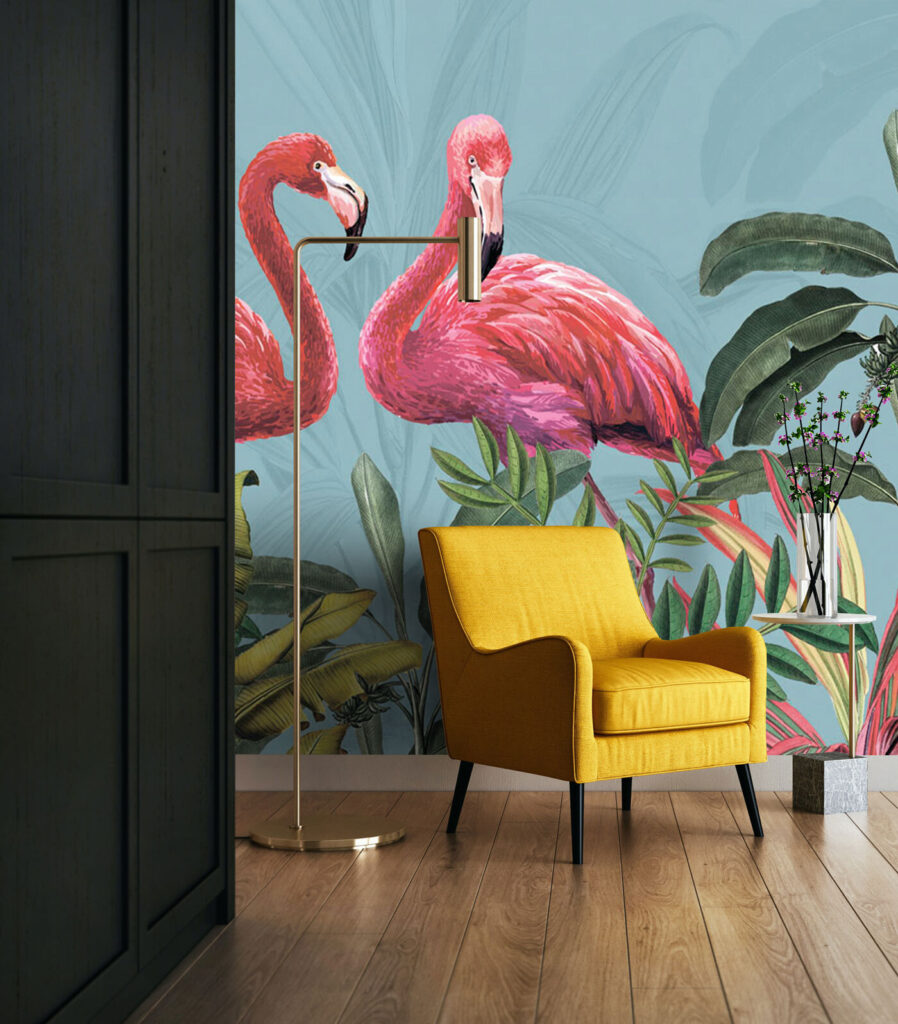 Two pink flamingos and green leaves