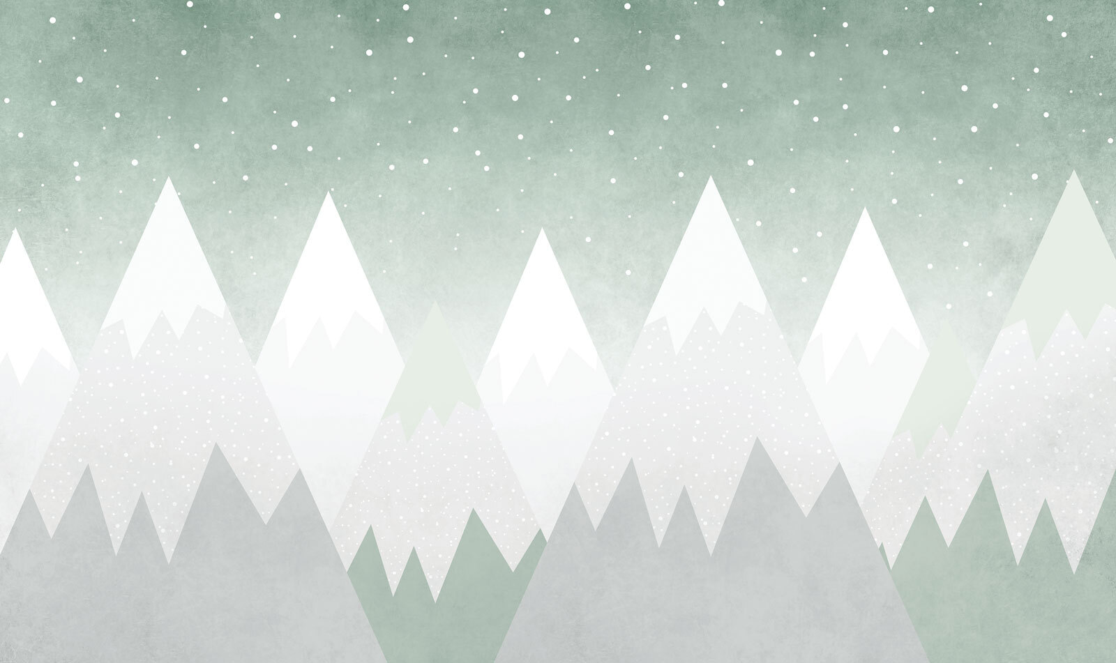 Mountain range with snow falling