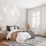 Fototapeten Weiße Blätter auf einer grauen Oberfläche