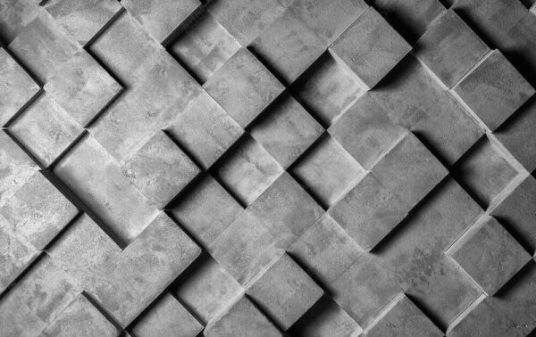 Graue und weiße Wand mit Quadraten Graue und weiße Wand mit Quadraten