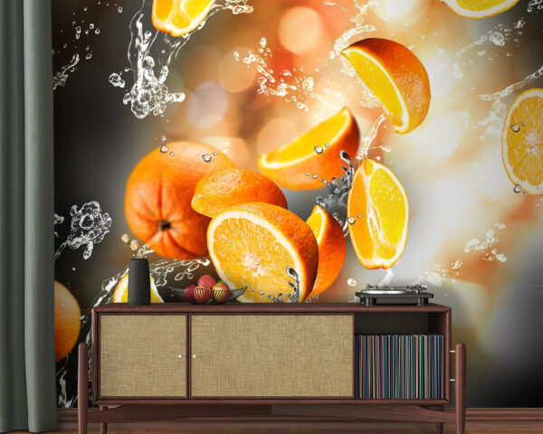Ins Wasser fallende Orangen mit Wasserspritzern Ins Wasser fallende Orangen mit Wasserspritzern