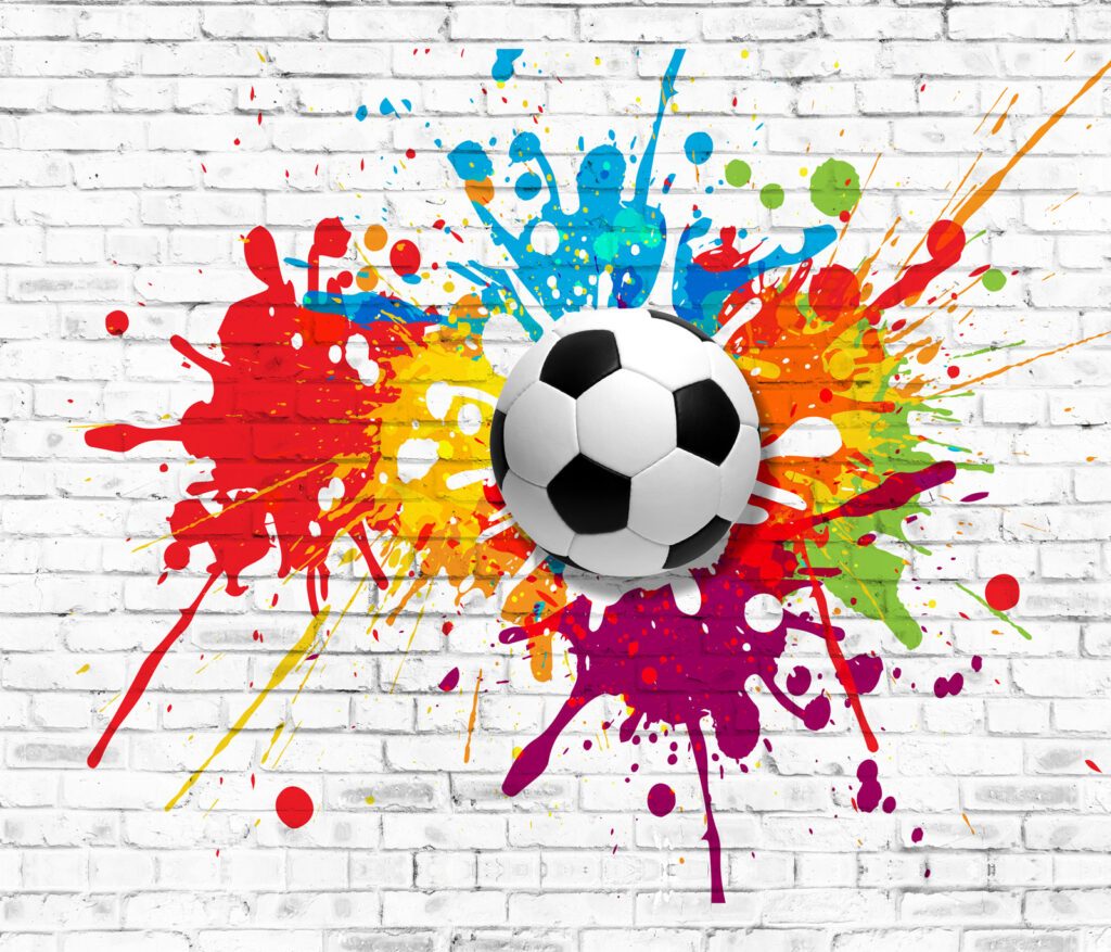 Fußball auf einer Ziegelmauer Fußball auf einer Ziegelmauer