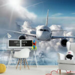 Fototapeten Ein Flugzeug fliegt in den Himmel