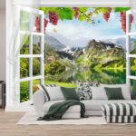 Fototapeten Fenster mit Blick auf einen See und Berge