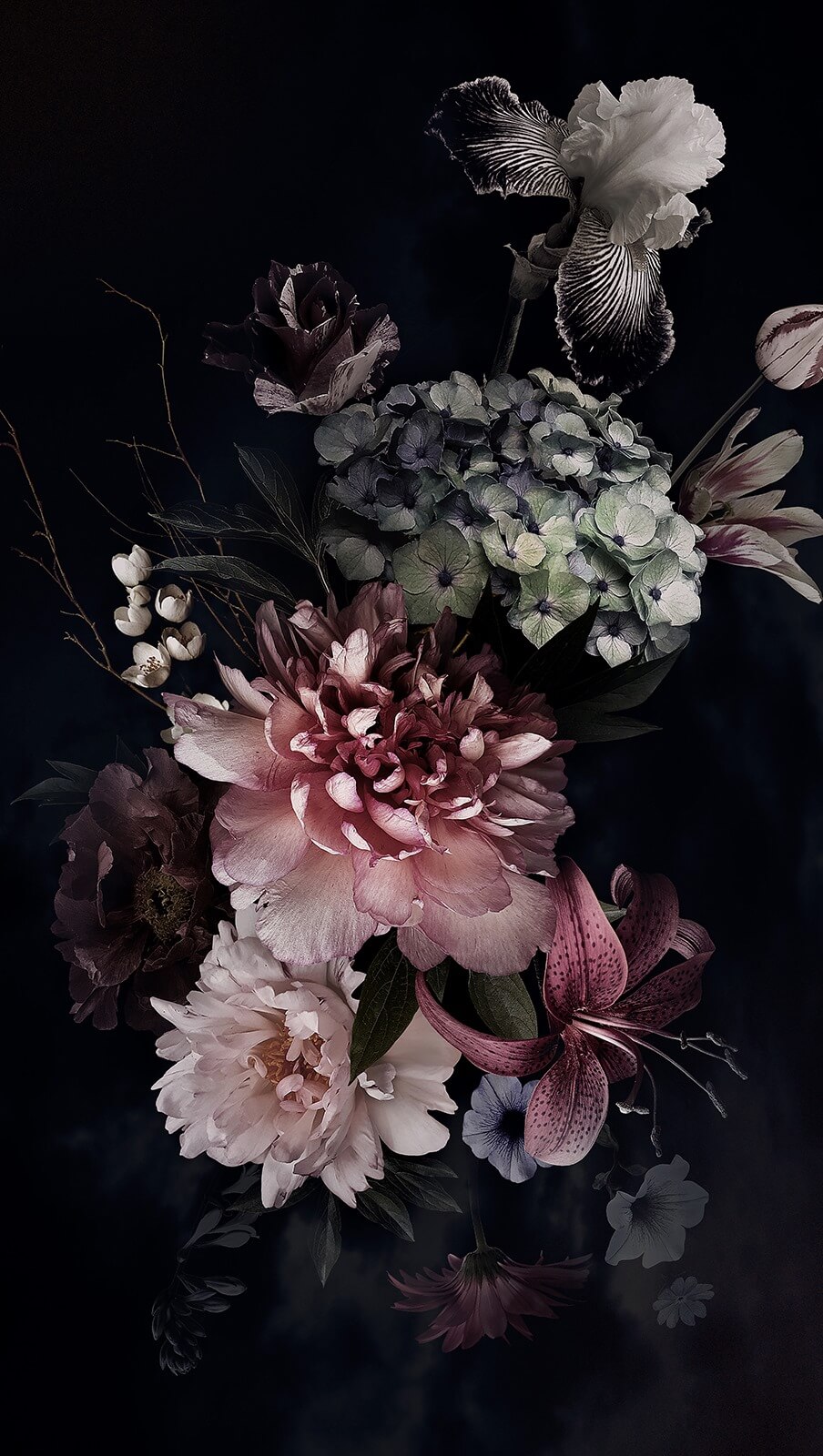 Elegant arrangement of dark blooms