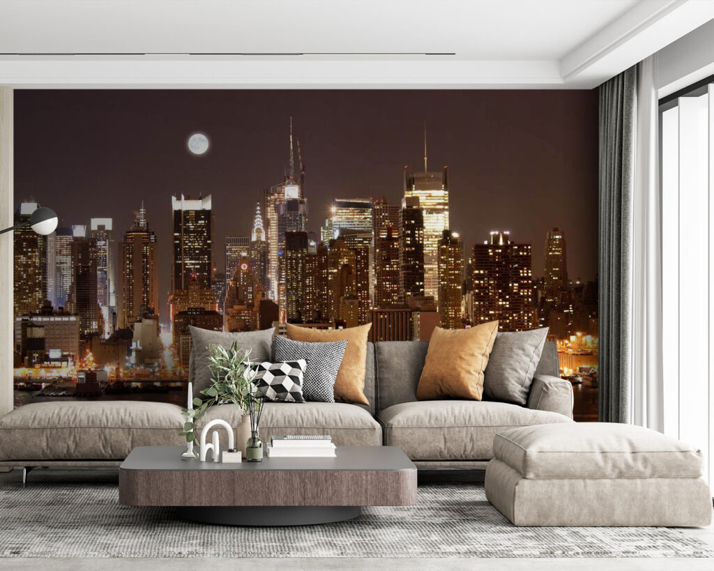 City skyline at night with the moon in the sky