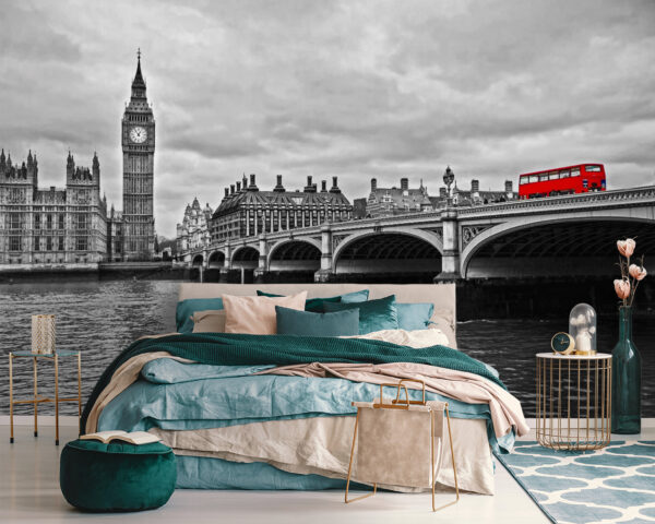 Bridge over water with a clock tower and a red bus Bridge over water with a clock tower and a red bus