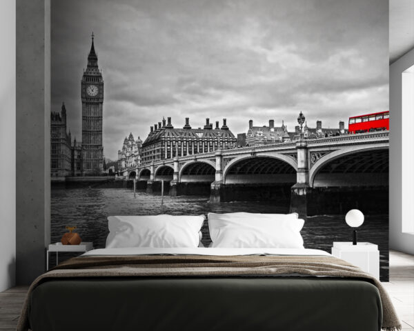 Bridge over water with a clock tower and a red bus Bridge over water with a clock tower and a red bus
