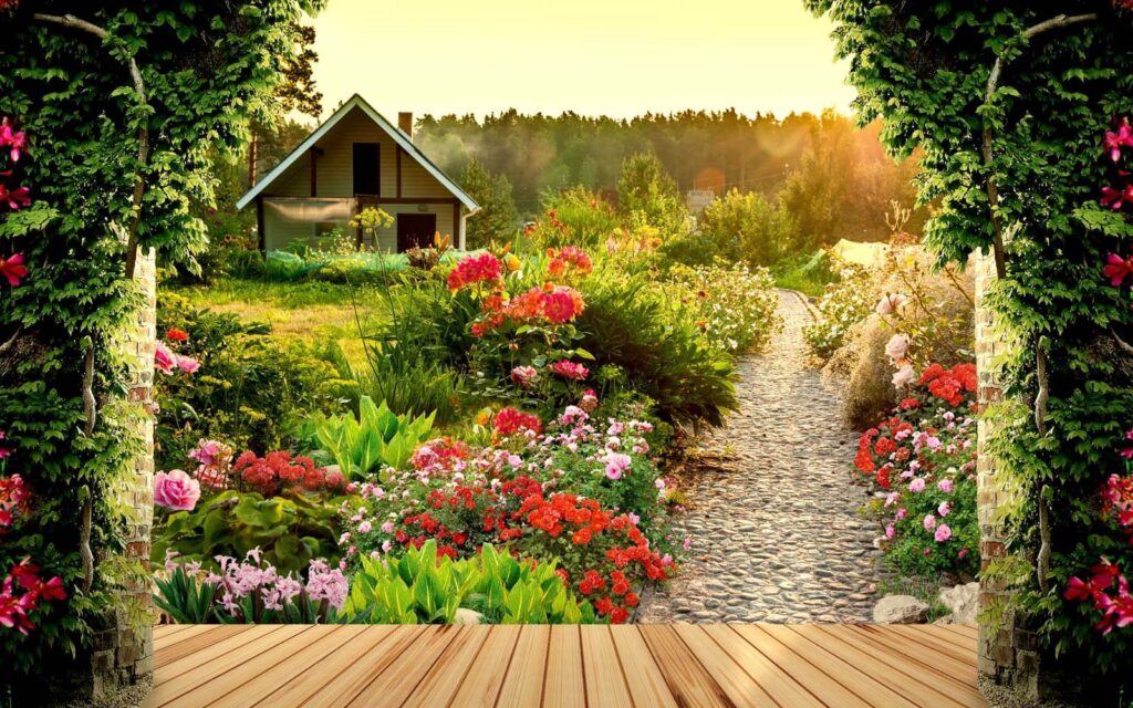 Garten mit Blumen und einem Haus Garten mit Blumen und einem Haus