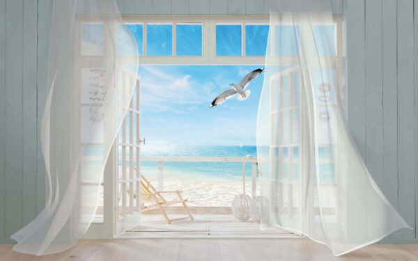 Blick auf einen Strand aus einem Zimmer mit einem Vogel, der über ihn fliegt Blick auf einen Strand aus einem Zimmer mit einem Vogel, der über ihn fliegt