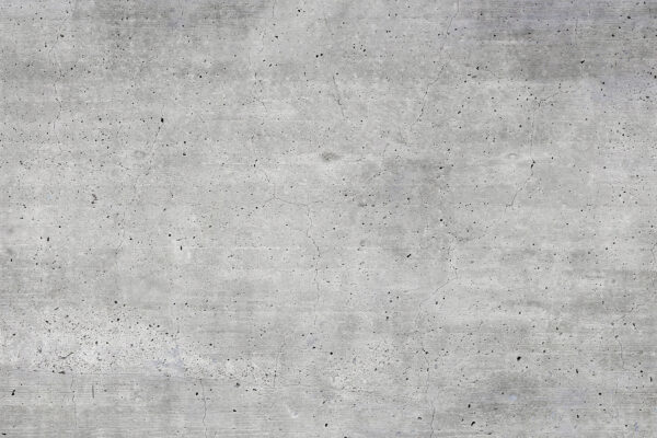 Graue Betonoberfläche mit kleinen Flecken Graue Betonoberfläche mit kleinen Flecken