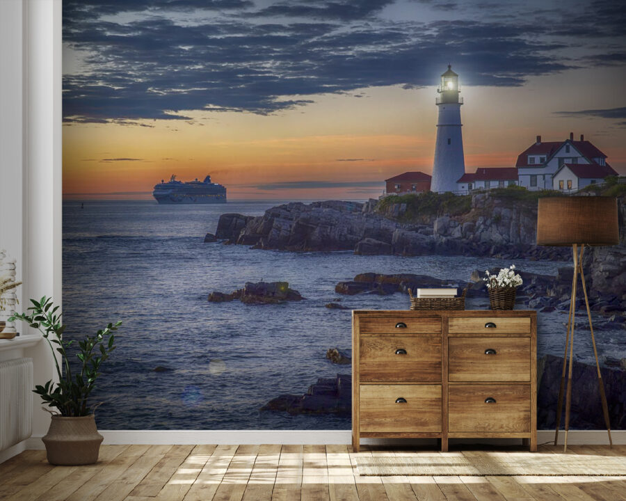 Leuchtturm an einer felsigen Küste mit einem Kreuzfahrtschiff im Hintergrund Leuchtturm an einer felsigen Küste mit einem Kreuzfahrtschiff im Hintergrund
