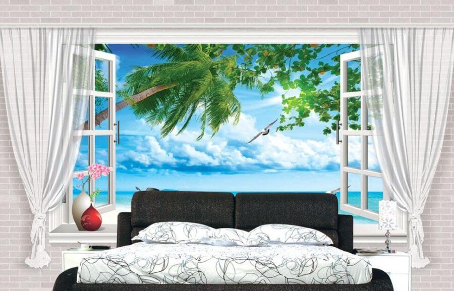 Fenster mit Blick auf den Strand und die Vögel