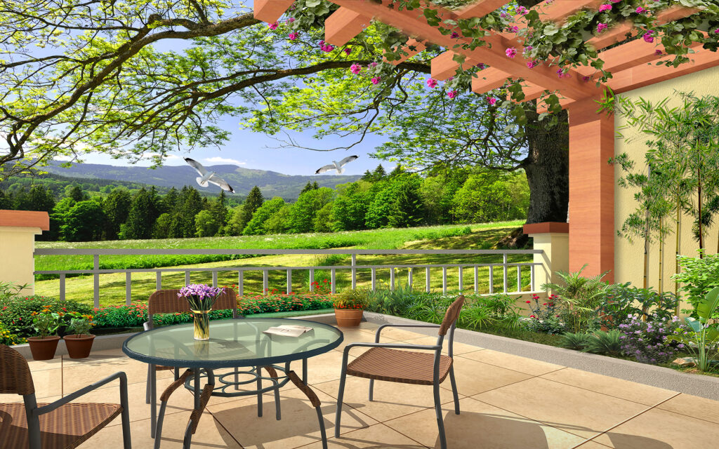 Terrasse mit Tisch und Stühlen und Blick auf eine grüne Wiese Terrasse mit Tisch und Stühlen und Blick auf eine grüne Wiese