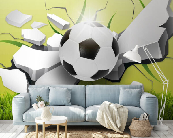Fußball, der eine Wand durchbricht Fußball, der eine Wand durchbricht