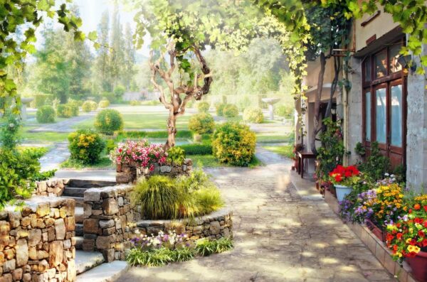 Steinweg mit einem Baum und Blumen Steinweg mit einem Baum und Blumen