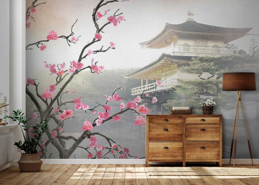 Baum mit rosa Blumen und einem Gebäude im Hintergrund Baum mit rosa Blumen und einem Gebäude im Hintergrund
