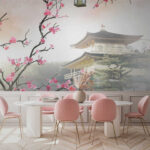 Fototapeten Baum mit rosa Blumen und einem Gebäude im Hintergrund