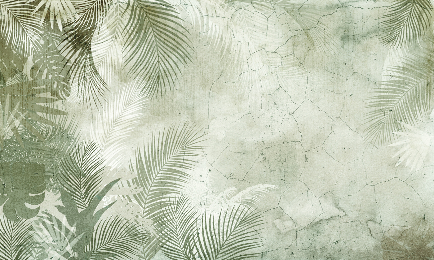 A wall with palm leaves