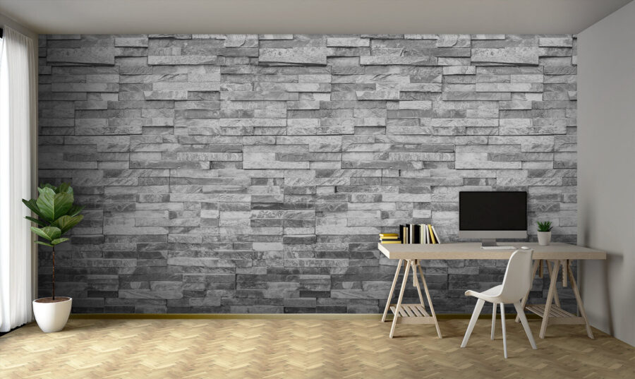 Strukturierte Steinwand in monochromem Design.