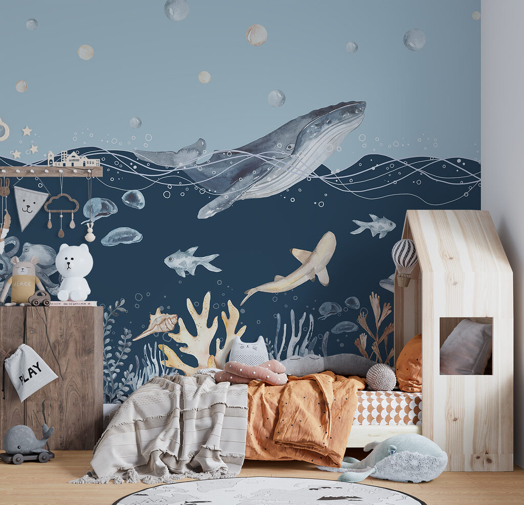 A watercolor of a whale and fish