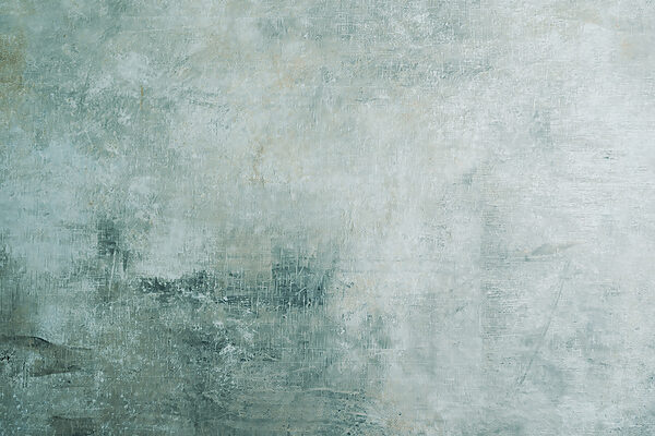Textured cool-toned surface background Textured cool-toned surface background