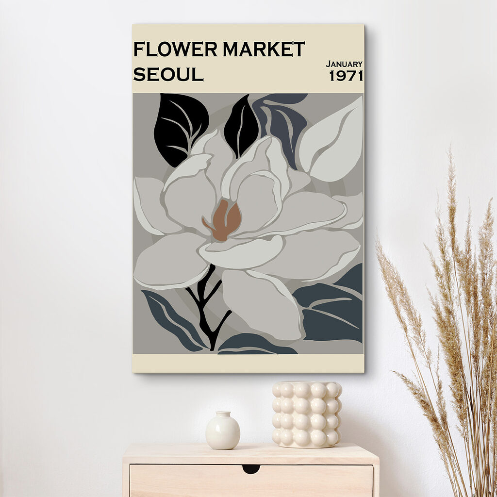 A white flower with black leaves