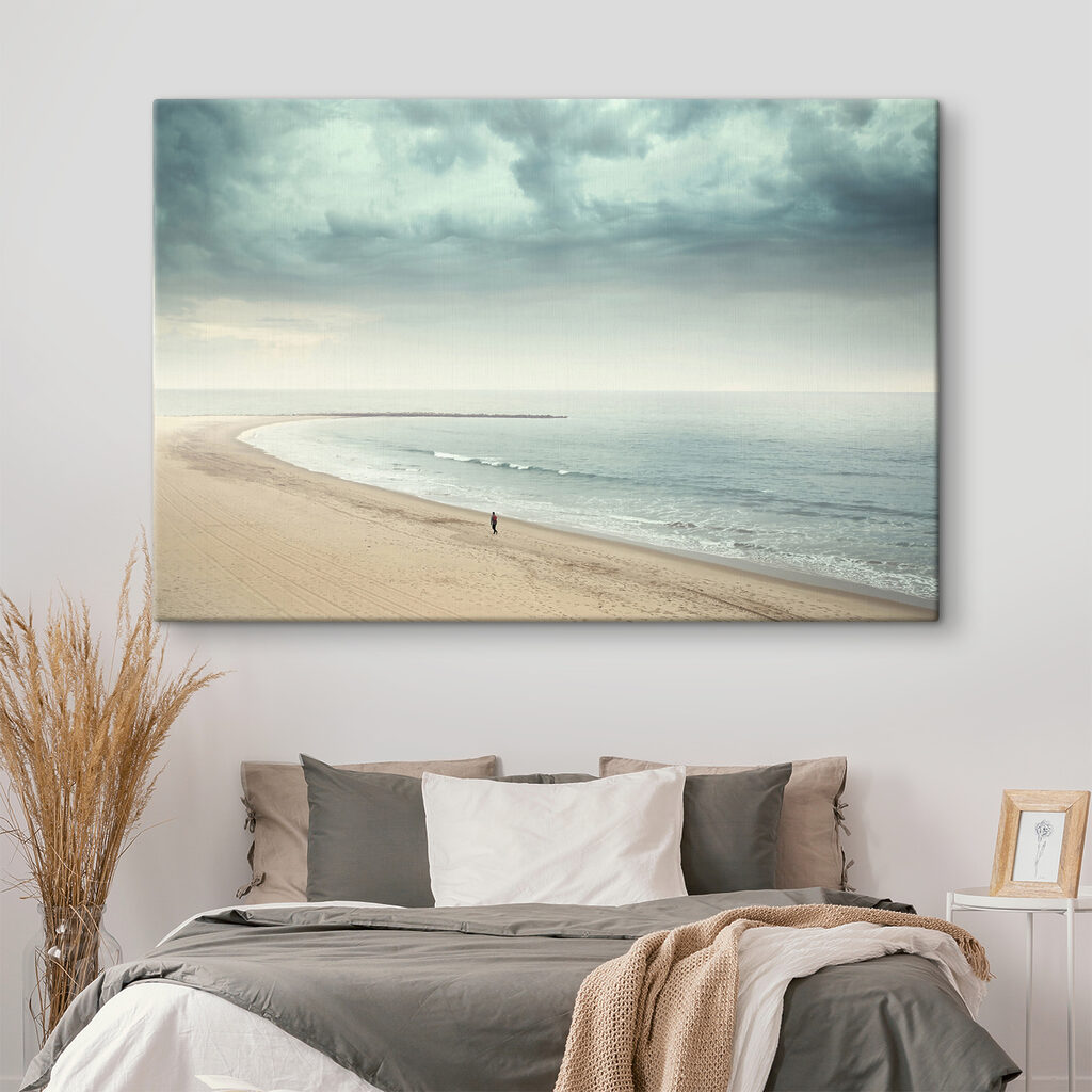 A person walking on a beach