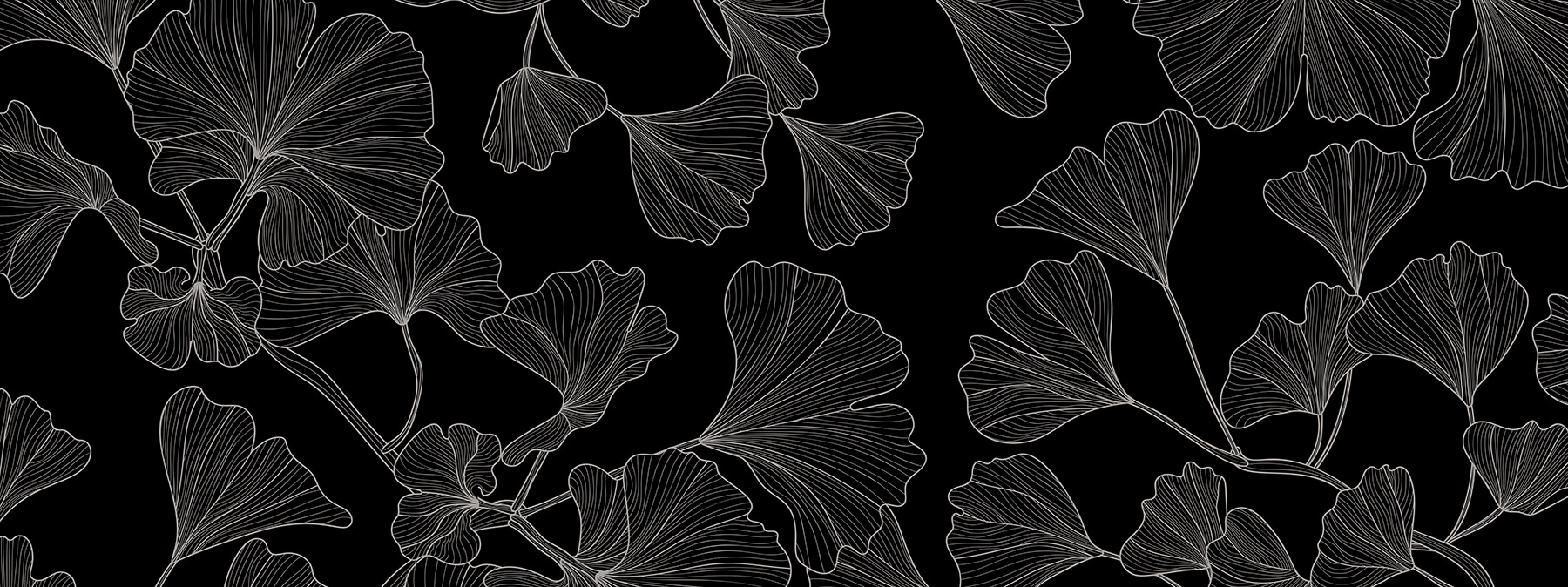 A black and white pattern of leaves