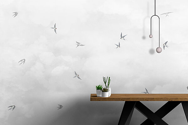 Eine Gruppe von Vögeln, die in den Himmel fliegen Eine Gruppe von Vögeln, die in den Himmel fliegen