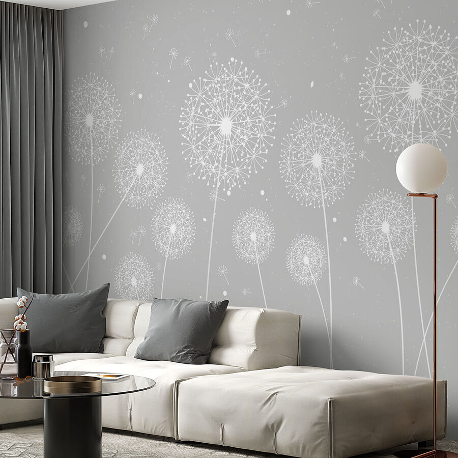Eine weiße Pusteblume auf grauem Hintergrund