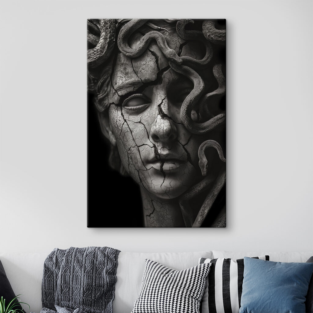 A statue of a woman with a cracked face and snakes around her face