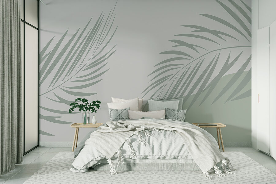 Palmenblätter auf grauem Hintergrund Palmenblätter auf grauem Hintergrund