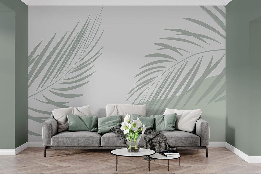 Palmenblätter auf grauem Hintergrund Palmenblätter auf grauem Hintergrund