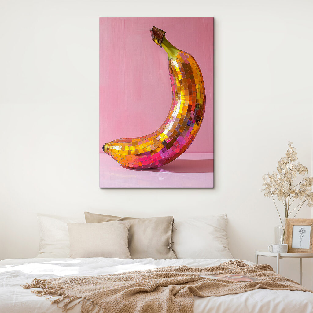 Colorful mirror banana on a pink background