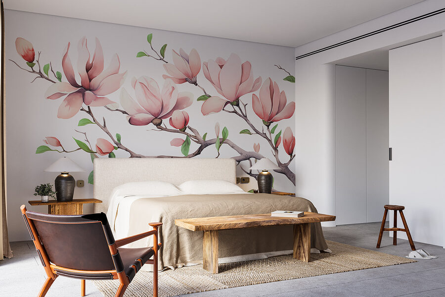 Zweig mit rosa Blüten und Blättern
