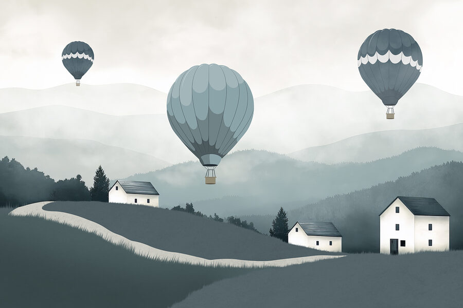 Gruppe von Heißluftballons fliegen über ein Dorf