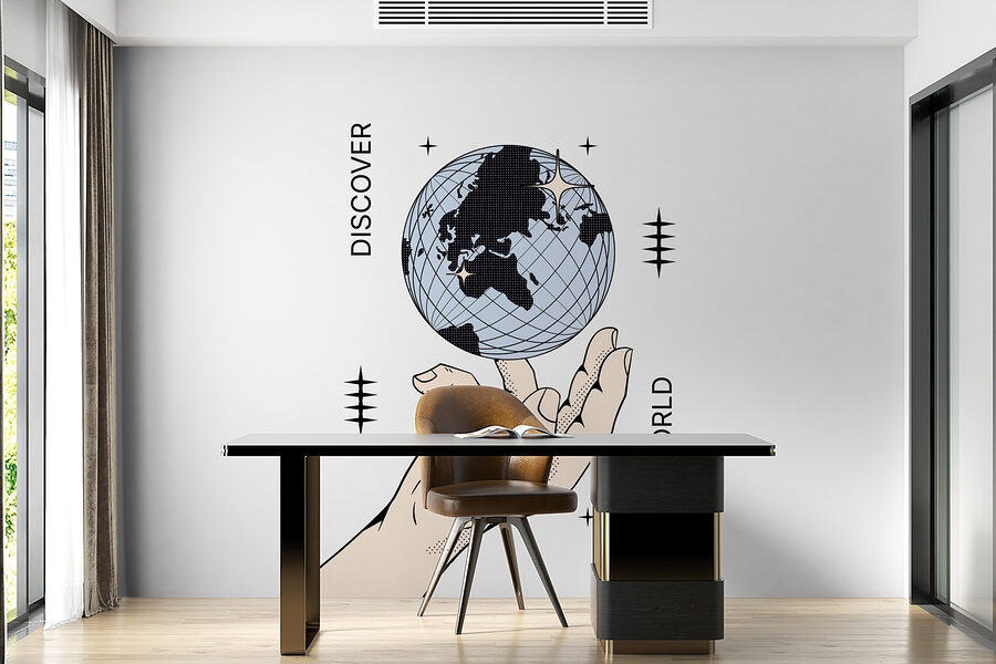 Hand hält einen Globus