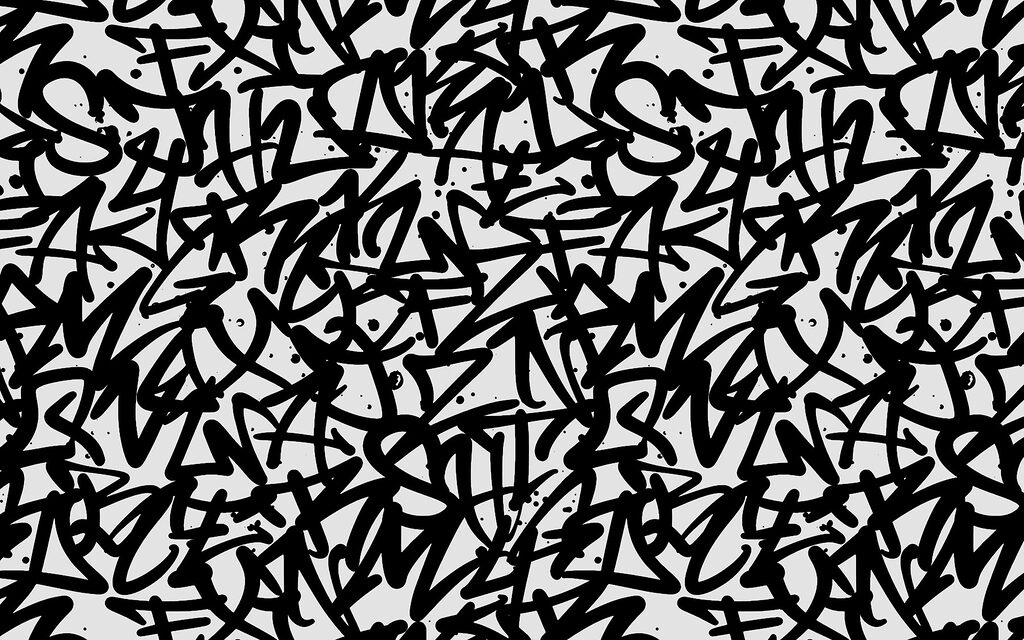 Schwarzes und weißes Muster mit Buchstaben Schwarzes und weißes Muster mit Buchstaben