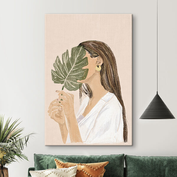 Frau hält ein Blatt Frau hält ein Blatt