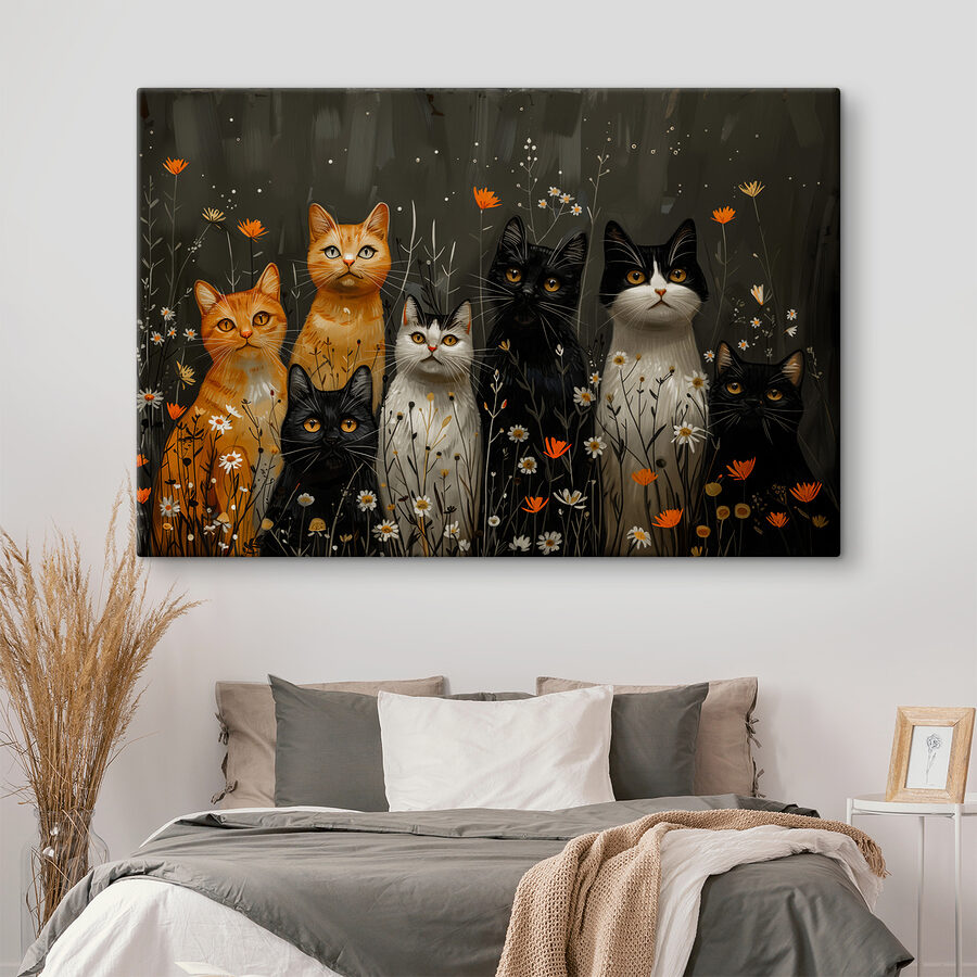 Gruppe von Katzen in einem Blumenfeld
