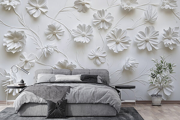 Weiße Papierblumen auf einer weißen Fläche Weiße Papierblumen auf einer weißen Fläche