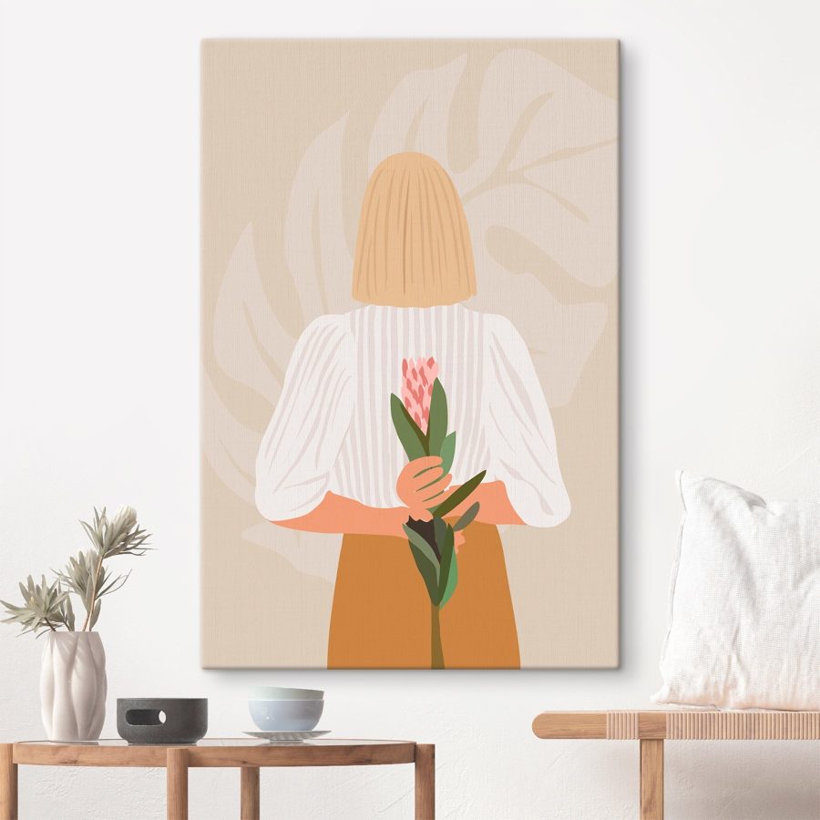Wandbilder Frau hält eine Blume