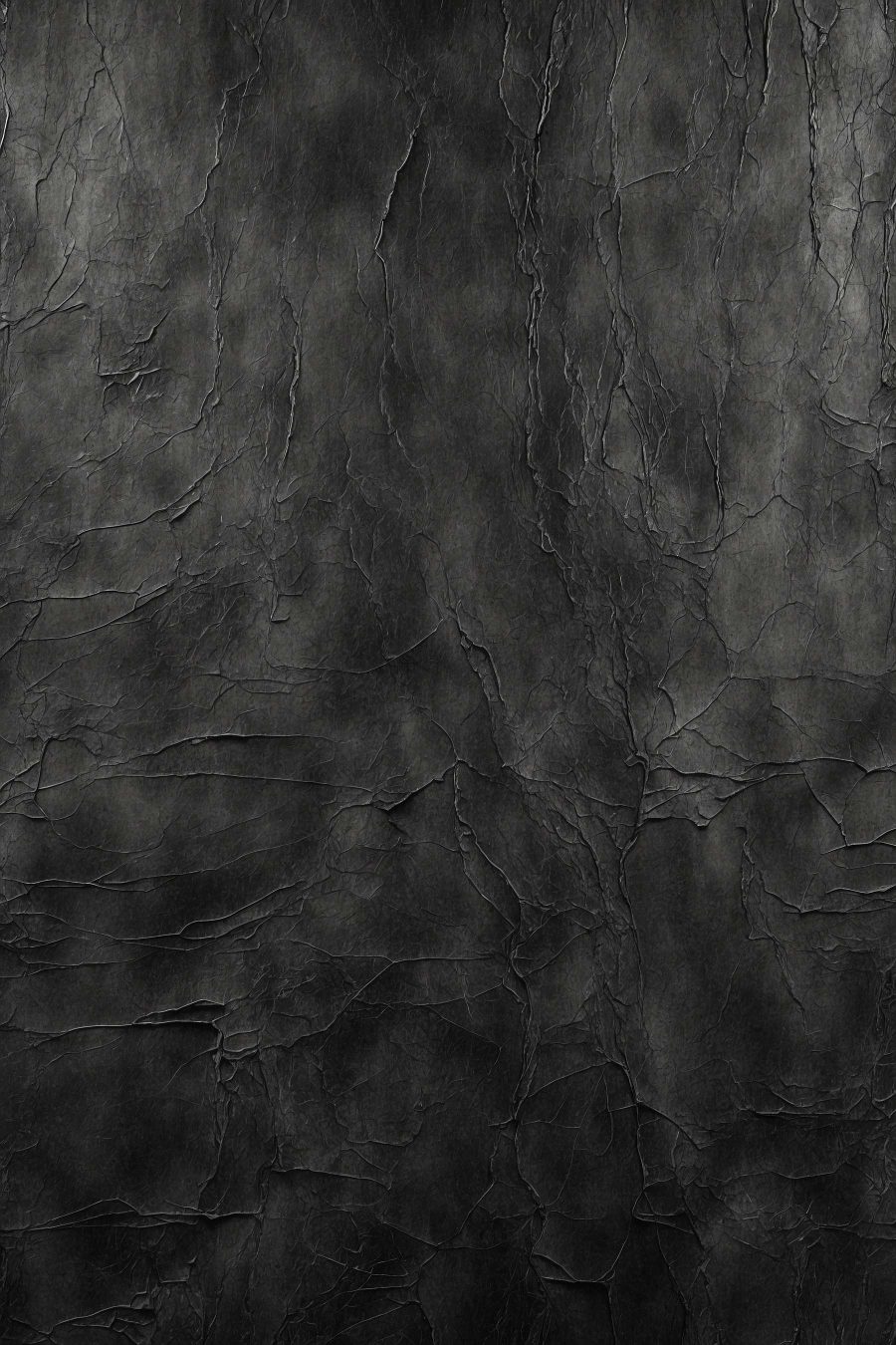 Schwarze Oberfläche mit Rissen