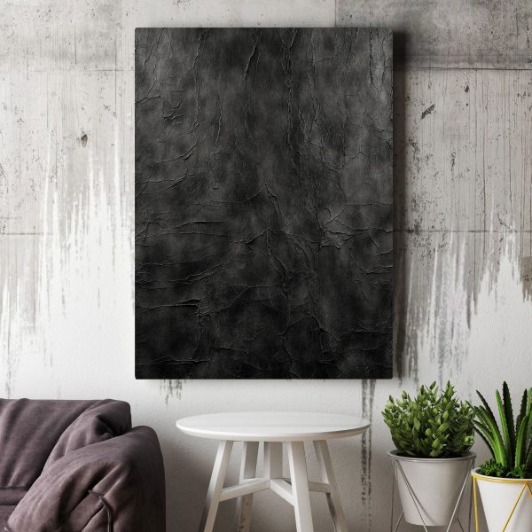 Schwarze Oberfläche mit Rissen Schwarze Oberfläche mit Rissen