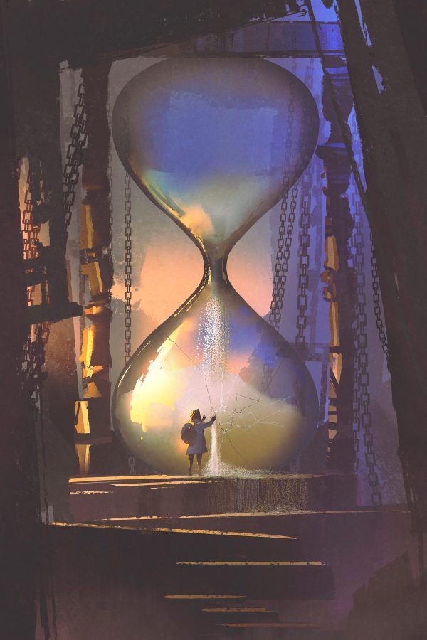Person, die in einer großen Sanduhr steht Person, die in einer großen Sanduhr steht