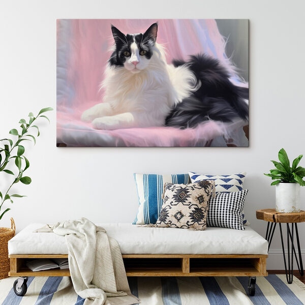 Schwarze und weiße Katze auf einer rosa Decke liegend Schwarze und weiße Katze auf einer rosa Decke liegend