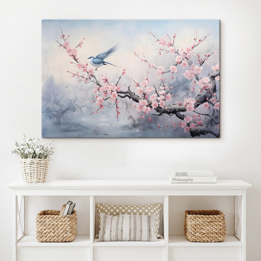 Vogel auf einem Zweig mit rosa Blüten