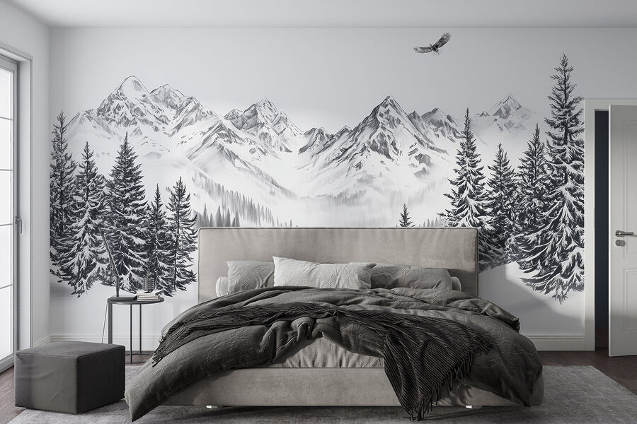 Verschneite Berglandschaft mit Bäumen und einem Vogel, der über sie fliegt